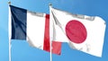 Japan and France flags against cloudy sky. Royalty Free Stock Photo