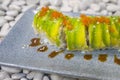 Japan gourmet cuisine - closeup and detail on delicious and delicate dish of Japanese sushi rolls in slate on stone background in Royalty Free Stock Photo