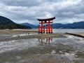 Japan Icon red Torii Gate Shrine with low tide, Itsukushima, Miyajima Island, Hiroshima, Japan Royalty Free Stock Photo