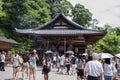 8.2018 Japan Kyoto.Buddhist temple.Visitors pray on area of Kinkaku-ji shrine