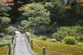 Japan Kyoto Tenju-an Temple garden with footpath and bridge Royalty Free Stock Photo