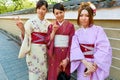 Japan. Kyoto. Young women dressed with traditional kimono