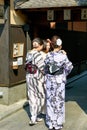 Japan. Kyoto. Young women dressed with traditional kimono