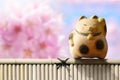 Japan Maneki Neko or beckoning cat, mascot of lucky and money, P Royalty Free Stock Photo