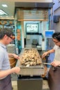 Japan. Miyajima. Hiroshima. Grilling oysters in a restaurant