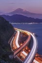 Japan Mt Fuji and Tomei Expressway, Shizuoka, Japan.Scenic view of Fuji Mountain with long exposure traffic light at dusk.