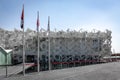 Japan national Pavilion at Expo 2020 Dubai with Japanese and UAE national flags in front.
