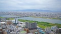 Japan Osaka city, buildings, river and bridge from aero view