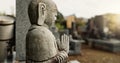 Japan, prayer hands and buddhist stone statue at graveyard for spiritual religion in Tokyo. Jizo, cemetery and Royalty Free Stock Photo