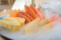 Japan raw salmon sashimi, sweet egg and imitation crab stick on ice pod in Japanese food restaurant. Fresh Japanese food concept Royalty Free Stock Photo