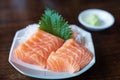 Japan raw salmon slice or salmon sashimi in japanese style. Salmon sasimi on disc Royalty Free Stock Photo