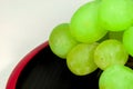 Japan`s green Muscat placed on a red lacquer ware Royalty Free Stock Photo