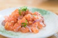 Japan salmon spicy salad with herbs. Mix Japanese and Thai food