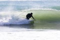 Japan Surf, a man surf many waves on many Surf boards during sunrise and sunset in a blue ocean. Surfing In Japan Royalty Free Stock Photo