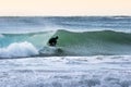 Japan Surf, a man surf many waves on many Surf boards during sunrise and sunset in a blue ocean. Surfing In Japan Royalty Free Stock Photo