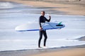 Japan Surf, a man surf many waves on many Surf boards during sunrise and sunset in a blue ocean. Surfing In Japan Royalty Free Stock Photo