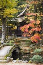 Japan Takayama Hokke-ji Temple garden with stone bridge Autumn