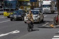 Japan, Tokyo, 04/12/2017. Cyclist on a city street Royalty Free Stock Photo