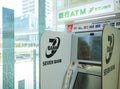 Japan, Toyko - August 9, 2019 - ATM of Seven Bank in Tachikawa. Seven Bank, Ltd.  is a Japanese bank. It is a subsidiary of Seven Royalty Free Stock Photo