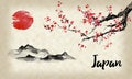 Japan traditional sumi-e painting. Sakura, cherry blossom. Mountain and sunset. Indian ink illustration. Japanese