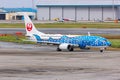 Japan Transocean Air Boeing 737-800 airplane at Okinawa Naha Airport in Japan Jinbei special livery Royalty Free Stock Photo