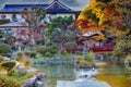 Japan Travel Destinations. Japanese Monastery During Seasonal Red Maples and Pond With Lantern on Sacred Mount Koyasan in Japan