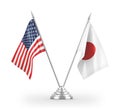 Japan and United States table flags isolated on white 3D rendering Royalty Free Stock Photo