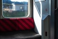 Japan, View from the inside of a rural Japanese train. the seats and a view of the countryside outside the window Royalty Free Stock Photo