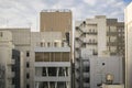 Japanese abstract urban background featuring details of chaotic city buildings in Tokyo downtown