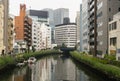 Japanese abstract urban background featuring details of chaotic city buildings Royalty Free Stock Photo