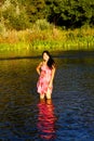 Japanese American Woman Standing In River Pink Dress Royalty Free Stock Photo