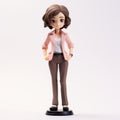Anime Figure In Pink Suit: Detailed And Accurate Female Figurine