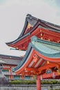 Japanese architecture, red temple with blue green roof Royalty Free Stock Photo