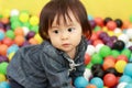 Japanese baby girl playing in ball pool Royalty Free Stock Photo