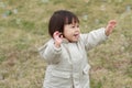 Japanese baby girl playing with bubble Royalty Free Stock Photo