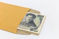 Japanese banknote 1,000 yen in brown envelope for give and business success and shopping Royalty Free Stock Photo