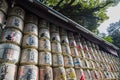 Japanese Barrels of Sake wrapped in Straw stacked on shelf Royalty Free Stock Photo