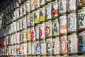 Japanese Barrels of Sake wrapped in Straw stacked on shelf