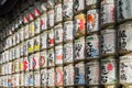 Japanese Barrels of Sake wrapped in Straw stacked on shelf Royalty Free Stock Photo