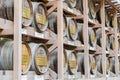 Japanese Barrels of Wine wrapped in Straw stacked on shelf Royalty Free Stock Photo