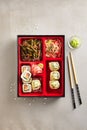 Japanese Bento Box with Sushi Rolls, Salad and Main Course Top V Royalty Free Stock Photo