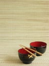 Japanese bowls with chopsticks Royalty Free Stock Photo