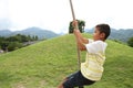 Japanese boy playing with flying fox Royalty Free Stock Photo