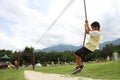 Japanese boy playing with flying fox Royalty Free Stock Photo