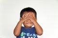 Japanese boy playing peek-a-boo