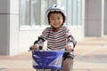 Japanese boy riding on the bicycle