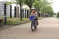 Japanese boy riding on the bicycle