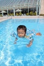 Japanese boy swiming in the pool Royalty Free Stock Photo