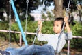 Japanese boy on the swing