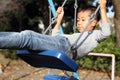 Japanese boy on the swing Royalty Free Stock Photo